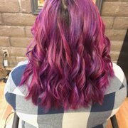 Vibrant pink and purple hair color