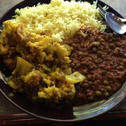 Aloo gobi and turkey and peas. Huge portions on this 2 entree plate. Yum!