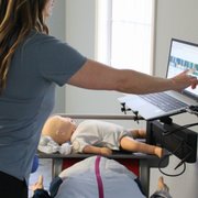 Touch screen on Voice-Assisted Manikin Station in office.