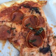 Pepperoni with balsamic glaze drizzle and basil