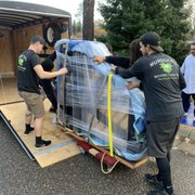 Loading a baby grand piano