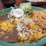 One enchilada plate, added sour cream & guac.