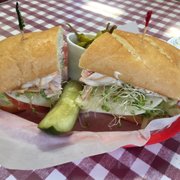 Smoked turkey, bacon and avocado. I added sprouts and got some peppers and a pickle on the side.