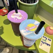 strawberry green tea with strawberry and mango popping boba