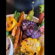 a plate of food with vegetables