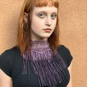 Copper color with razor cut, and micro bangs. Handmade lace choker.